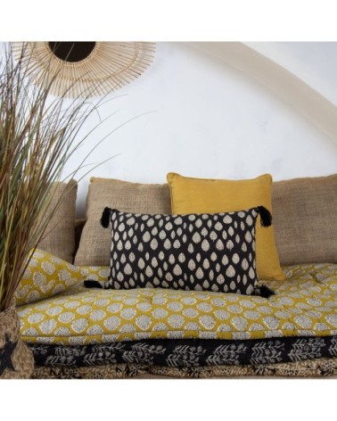 Coussin en coton noir avec pompons noirs 30x50