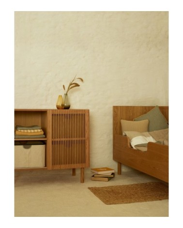 Commode en bois naturel avec porte coulissante ajourée