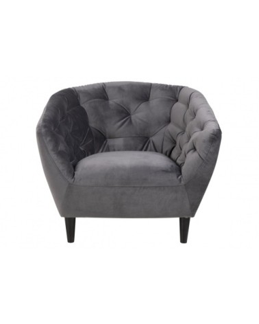 Fauteuil en velours capitonné