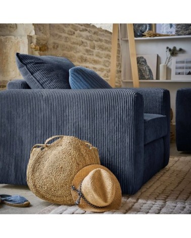 Fauteuil en velours côtelé bleu