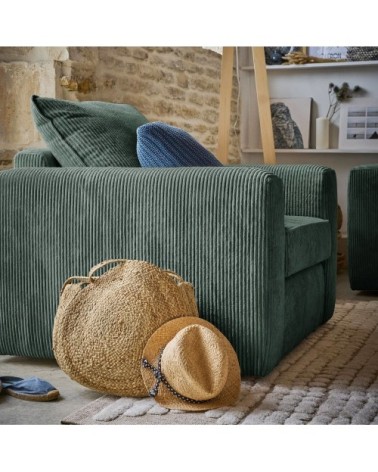 Fauteuil en velours côtelé vert