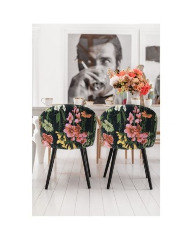 Chaise en tissu noir imprimés fleurs et pin