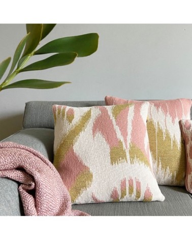 Coussin ikat tricoté rose 50x50